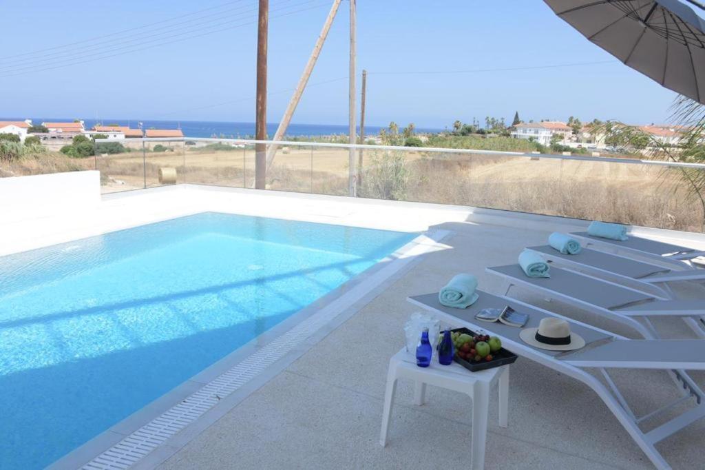 Seaside Luxury Villa พาราลิมนี ภายนอก รูปภาพ